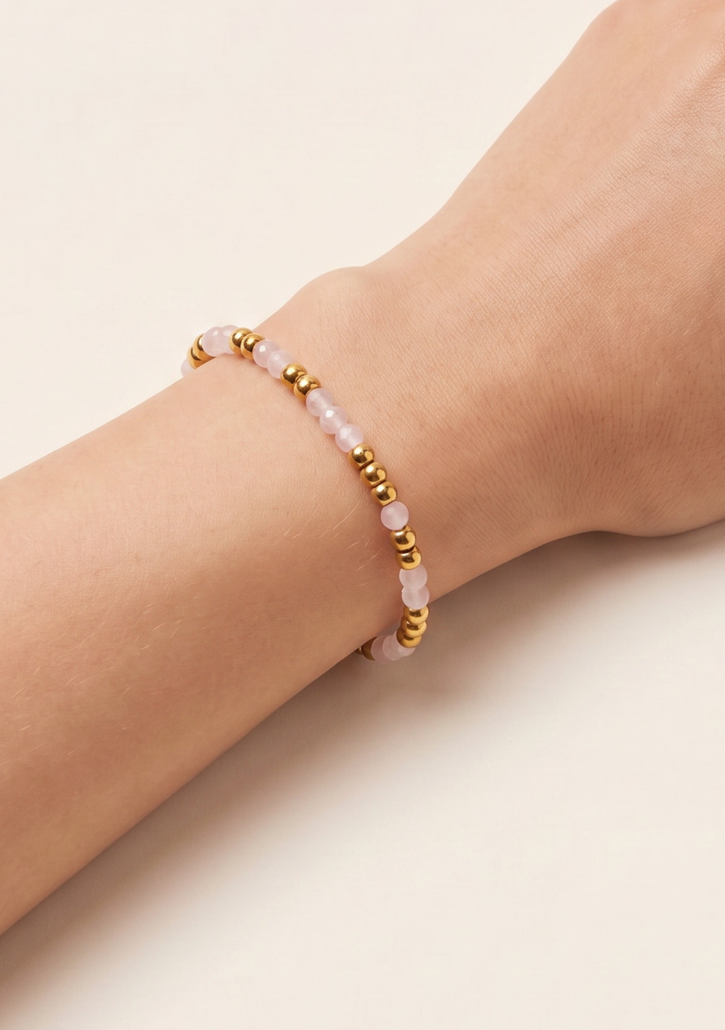 Triskart Rosenquarz Armband vergoldet